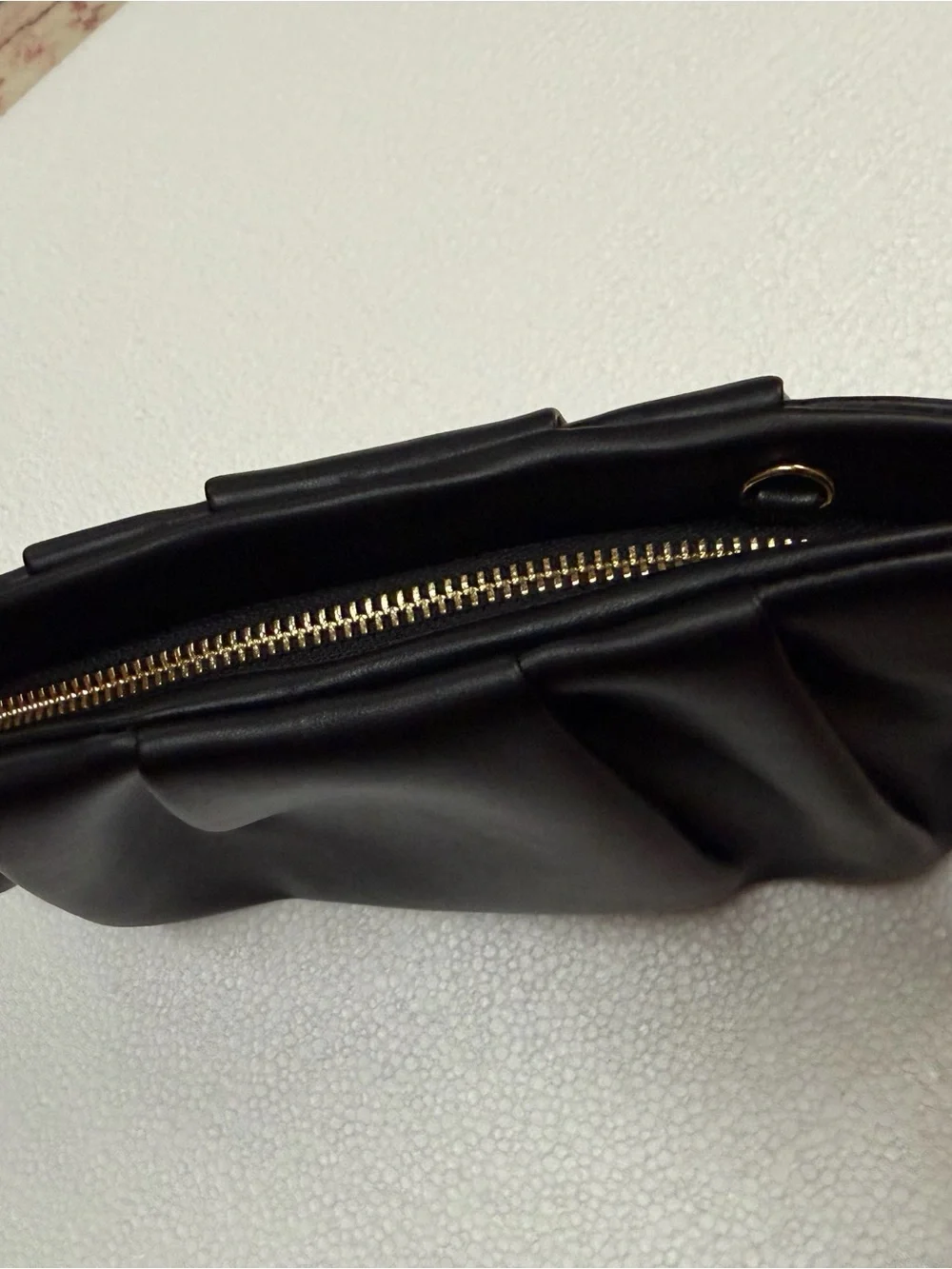 Sleek Black Fold-Detail Wristlet Clutch with Gold Zip